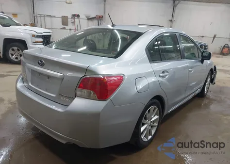 2012 Subaru Impreza 2.0I Premium z USA, uszkodzony, nr VIN JF1GJAC68CH015021